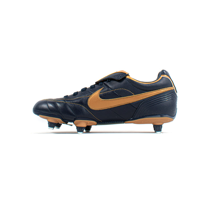 nike tiempo black gold